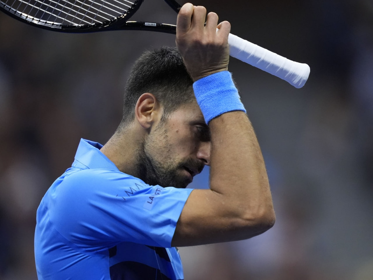 قهرمان المپیک از گرنداسلم آمریکا کنار رفت2